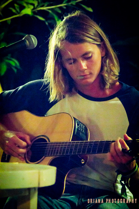 Addison plays the guitar in Playa Guiones.  Photo by Oriana Fowler